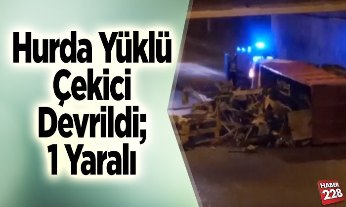 Hurda yüklü çekici devrildi 1 yaralı
