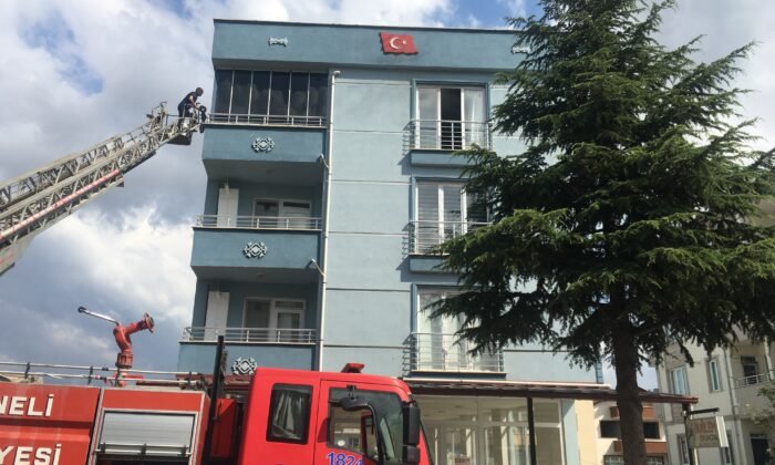 OSMANELİ'DE 4 KATLI BİNADA YANGIN
