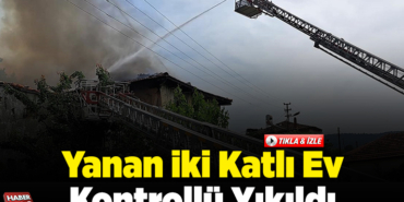Yanan iki katlı ev kontrollü yıkıldı