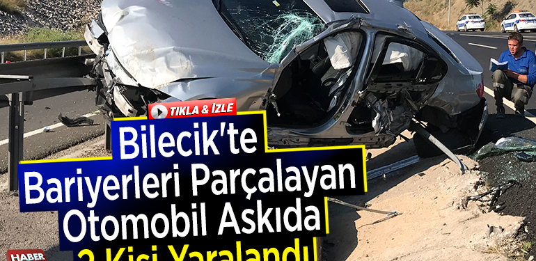 Bilecik’te Bariyerleri Parçalayan Otomobil Askıda Kaldı 2 Kişi Yaralandı
