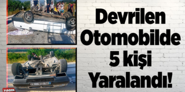 Devrilen otomobilde 5 kişi yaralandı