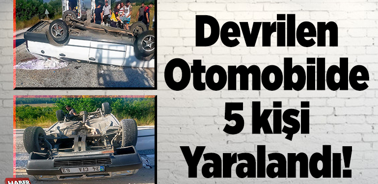 Devrilen otomobilde 5 kişi yaralandı