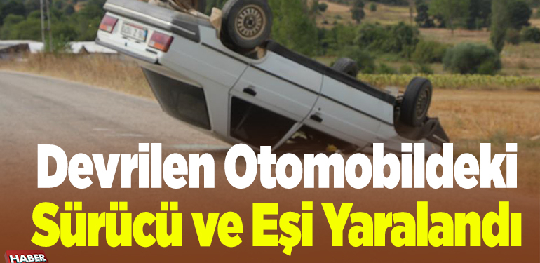 Devrilen otomobildeki sürücü ve eşi yaralandı