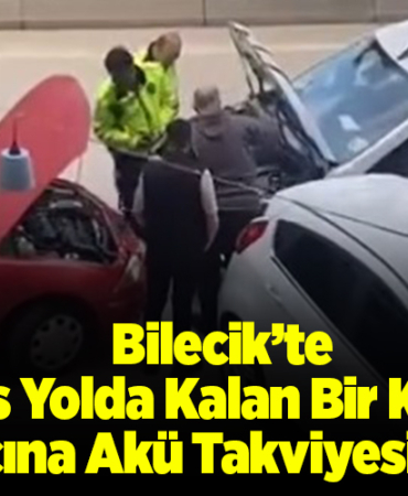 Bilecik’te polis yolda kalan bir kişinin aracına akü takviyesi yaptı